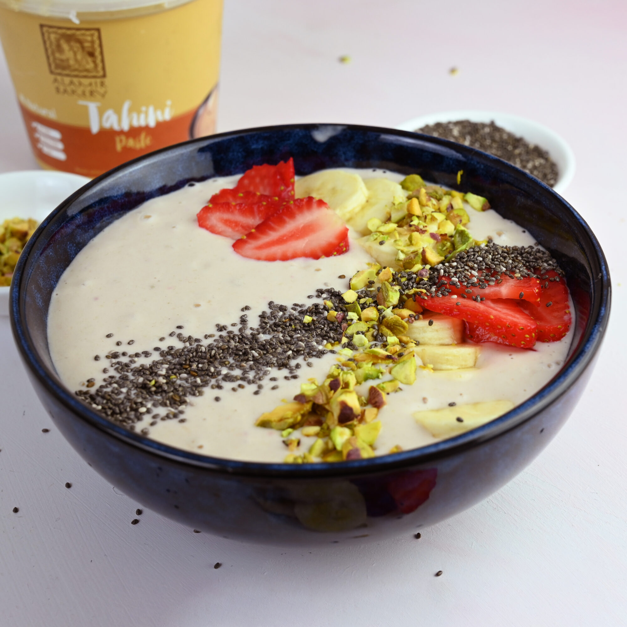 Top your thick creamy banana tahini bowl with your favourite toppings