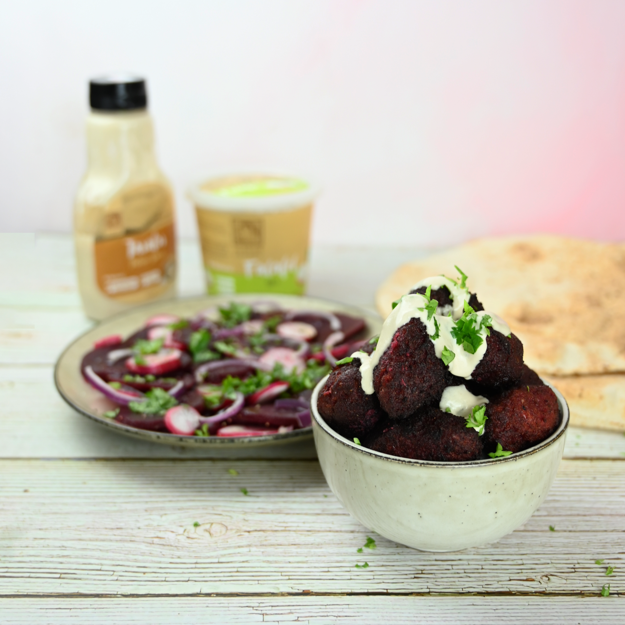 Crispy falafels with added beetroot pulp and tarator